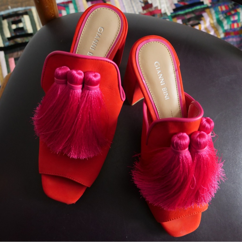 Red leather Gianni Bini mules with magenta tassels